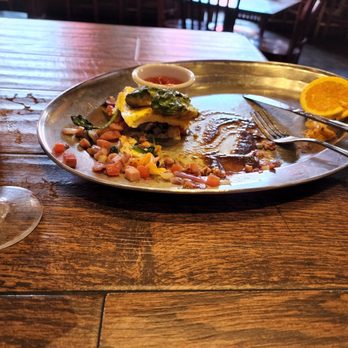 Saddle Ranch - delicious ham, bacon and cheese omelet with spinach and tater tots - Steakhouses Near Me - Orange, California Saddle Ranch - delicious ham, bacon and cheese omelet with spinach and tater tots - Steakhouses Near Me - Orange, California