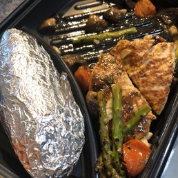 Idaho Baked Potato and grilled chicken with vegetables Idaho Baked Potato and grilled chicken with vegetables