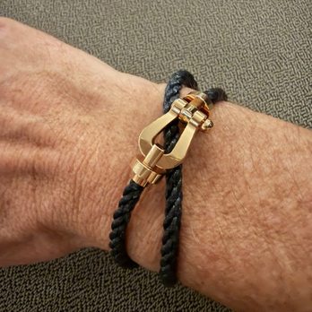 Saphir Joyeros - My bracelet purchase, an 18k yellow gold medium Fred-Force 10 with a double wrapped cord. - Jewelry Near Me - Meloneras, GC