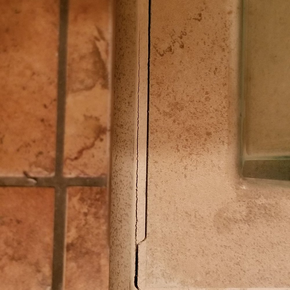 Iron Oak Construction - One year later new tilt coming loose grout cracking - General Contractors Near Me Iron Oak Construction - One year later new tilt coming loose grout cracking - General Contractors Near Me