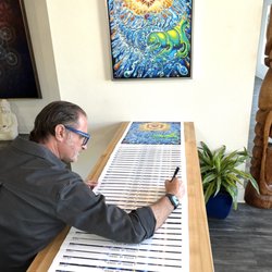 Brophy Art Gallery - Drew Brophy signing his Circle of Twelve limited edition art prints.