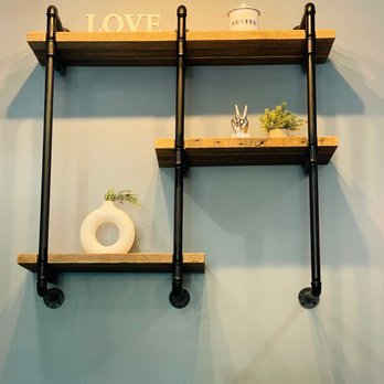 Foxtail Coffee - Telecom Village - a shelf with two shelves and a vase - Coffee & Tea Near Me - Temple Terrace, Florida Foxtail Coffee - Telecom Village - a shelf with two shelves and a vase - Coffee & Tea Near Me - Temple Terrace, Florida