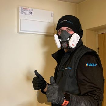 Heath Electrical Services - Lincoln finishing installation of a consumer unit in his new gear! - Electricians Near Me - Bradwell Common, MIK Heath Electrical Services - Lincoln finishing installation of a consumer unit in his new gear! - Electricians Near Me - Bradwell Common, MIK