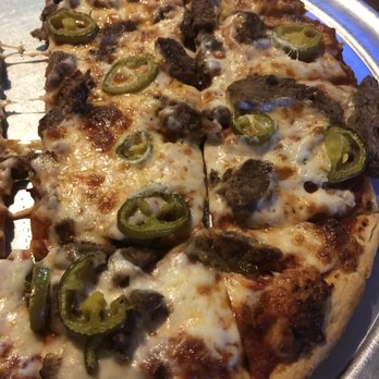 BJ's Restaurant & Bar - Steak fajita pizza with jalapeños - Beer Bar Near Me - Mingus, Texas BJ's Restaurant & Bar - Steak fajita pizza with jalapeños - Beer Bar Near Me - Mingus, Texas
