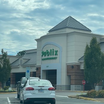Publix - a woman standing in front of a publix store - Pharmacy Near Me - Colonial Heights, Virginia Publix - a woman standing in front of a publix store - Pharmacy Near Me - Colonial Heights, Virginia