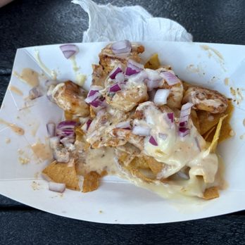 Fuego Taquito - Shrimp nachos - after started eating them - Food Trucks Near Me Fuego Taquito - Shrimp nachos - after started eating them - Food Trucks Near Me