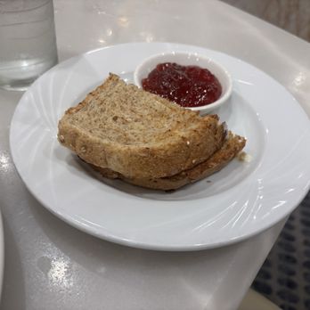 Café Milano - Wheat toast with jelly. The bread was super tasty. - American Near Me - Reno, Nevada