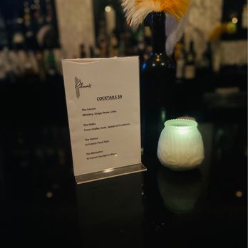 The Belmont - a menu and a candle on a table - Music Venues Near Me - Austin, Texas The Belmont - a menu and a candle on a table - Music Venues Near Me - Austin, Texas