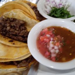 Carnitas, carne asada, beef and chorizo tacos