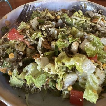 Burma Superstar - Tea Leaf Salad Fermented tea leaf dish tossed with a crispy mixture of nuts, chickpeas, sesame seeds, fried garlic, with lettuce. - Burmese Near Me - Oakland, California Burma Superstar - Tea Leaf Salad Fermented tea leaf dish tossed with a crispy mixture of nuts, chickpeas, sesame seeds, fried garlic, with lettuce. - Burmese Near Me - Oakland, California