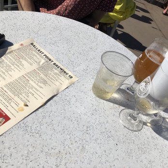 Ballast Point Brewing Long Beach - This is my table after the waitress "cleaned it", left half of the trash behind and never returned. - Breweries Near Me - Long Beach, California