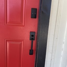 Exterior outside entrance of Sutton's Sierra Lock & Key - Outside view of new pitcher handle and keypad deadbolt. Exterior outside entrance of Sutton's Sierra Lock & Key - Outside view of new pitcher handle and keypad deadbolt.