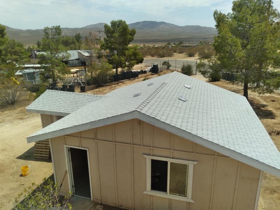 Slide of Outlaw Roofing