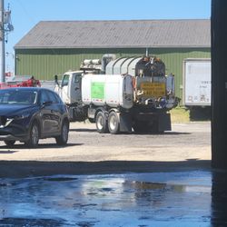 Preferred Emergency Towing and Recovery - Picture of their driver pulling away with my truck, forgot to put a stop , turn signal bar on the back.  Luckily nobody hit the back of my t