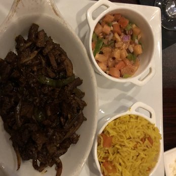 Maaza 29 - Awaze tibs (beef), tomato salad and Mediterranean rice - Ethiopian Near Me - Gainesville, Virginia Maaza 29 - Awaze tibs (beef), tomato salad and Mediterranean rice - Ethiopian Near Me - Gainesville, Virginia
