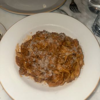 Chez Maggy - Maggy's Bolognese: beef & pork ragu, parmesan cheese - French Near Me - Denver, Colorado Chez Maggy - Maggy's Bolognese: beef & pork ragu, parmesan cheese - French Near Me - Denver, Colorado