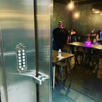 Boba Bear - Like the unique, vintage, ornate feel of the elevator entrance. Also enjoy the multi color glow from the hookah devices on the table. - Hookah Bars Near Me - Rowland Heights, California