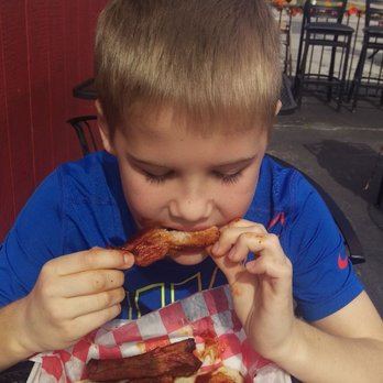 Big Daddy's BBQ - Little man loves ribs! - Barbeque Near Me - Columbia, Missouri