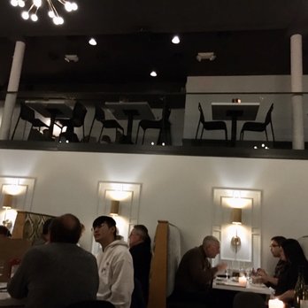 Sava's - Pic of inside of restaurant with view of open upstairs dining area/seating - great nighttime ambience! - Bars Near Me - Ann Arbor, Michigan Sava's - Pic of inside of restaurant with view of open upstairs dining area/seating - great nighttime ambience! - Bars Near Me - Ann Arbor, Michigan