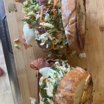 Between the Bread - OsO Grande pork chop bacon chimichuri Swiss cheese coleslaw garlic aioli - Pop-Up Restaurants Near Me