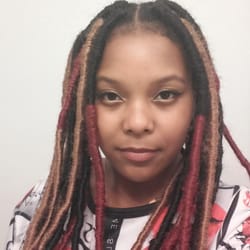 Belle Cheveux Studios - Red, blonde, and black faux locs