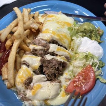 Chelino's Mexican Restaurant - Burrito supreme with shredded beef - Mexican Near Me - Oklahoma City, Oklahoma Chelino's Mexican Restaurant - Burrito supreme with shredded beef - Mexican Near Me - Oklahoma City, Oklahoma