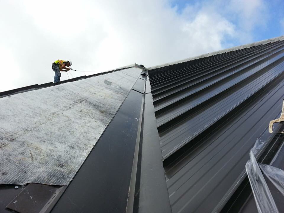 Slide of Patch Adams Roofing