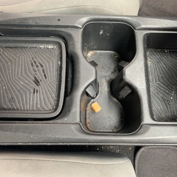 Zipcar - Cup holders and middle area filled with tobacco, ashes and marijuana debris - Car Rental Near Me Zipcar - Cup holders and middle area filled with tobacco, ashes and marijuana debris - Car Rental Near Me
