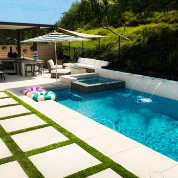Sunset Outdoor Creations - Sleek pool design, fire pit, and white concrete, as we asked! - General Contractors Near Me - Corona, California Sunset Outdoor Creations - Sleek pool design, fire pit, and white concrete, as we asked! - General Contractors Near Me - Corona, California