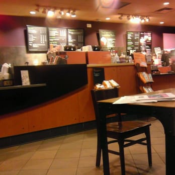 Starbucks - a table and chairs in a coffee shop - Coffee & Tea Near Me - Toronto, Ontario Starbucks - a table and chairs in a coffee shop - Coffee & Tea Near Me - Toronto, Ontario