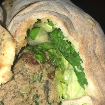 Nile Cafe - The beef kabob sandwich on pita. I actually took 90% of the lettuce out - Mediterranean Near Me - Long Beach, California
