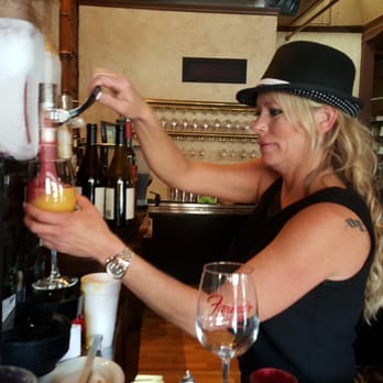 Farina's Winery & Cafe - Stephanie mixing drinks.. - Italian Near Me - Grapevine, Texas Farina's Winery & Cafe - Stephanie mixing drinks.. - Italian Near Me - Grapevine, Texas
