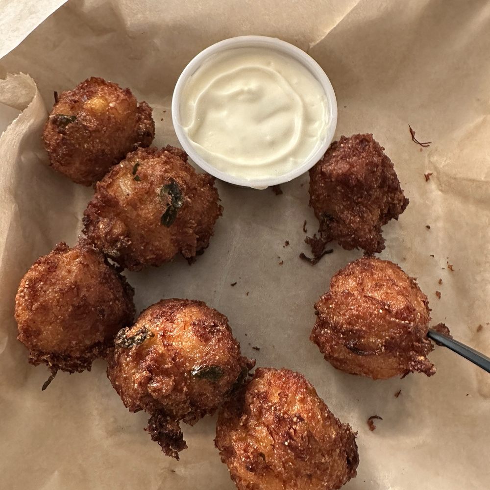 Conner's Kitchen + Bar - Lump Crab Hushpuppies - Breakfast & Brunch Near Me - Indianapolis, Indiana Conner's Kitchen + Bar - Lump Crab Hushpuppies - Breakfast & Brunch Near Me - Indianapolis, Indiana