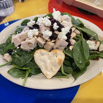 The Wolf Cafe - Spinach salad w/grilled chicken, sliced almonds, and goat cheese w/honey lime vinaigrette I think. It was fantastic whatever was in it! - Coffee & Tea Near Me - Ballwin, Missouri The Wolf Cafe - Spinach salad w/grilled chicken, sliced almonds, and goat cheese w/honey lime vinaigrette I think. It was fantastic whatever was in it! - Coffee & Tea Near Me - Ballwin, Missouri