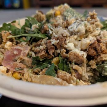 CAVA - Harisaa Avacado Bowl with ingredients mixed up - Mediterranean Near Me - Austin, Texas