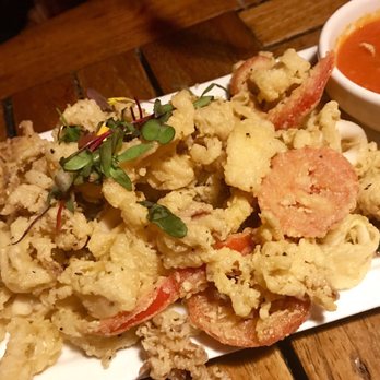 The Cottage - Calamari with two diff side sauces - New American Near Me - Sarasota, Florida The Cottage - Calamari with two diff side sauces - New American Near Me - Sarasota, Florida