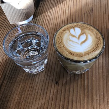 Relevant Coffee - Cortado with a side of mineral water and a latte to go - Coffee & Tea Near Me - Vancouver, Washington