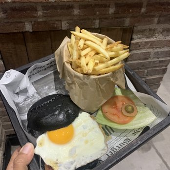 Juanchi's Burger - Sunny Burger with a side of fries. - Burgers Near Me - Madrid, M