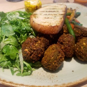 Tender Greens - Double Falafal plate with Baby Arugula and seasoned veggies. - Salad Near Me - Berkeley, California Tender Greens - Double Falafal plate with Baby Arugula and seasoned veggies. - Salad Near Me - Berkeley, California