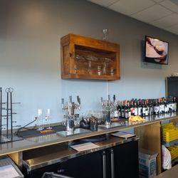 The Wine Shop - Behind the bar at The Wine Shop at Rivergate, Charlotte