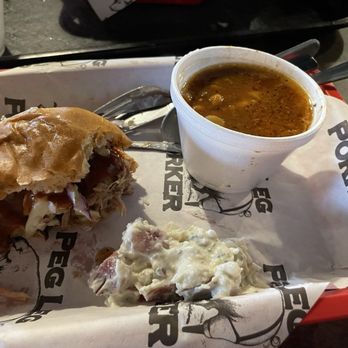 Peg Leg Porker - Pulled pork sandwich, potato salad and baked beans. - Barbeque Near Me - Nashville, Tennessee