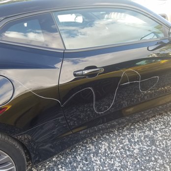 Duval Inn - Car keyed overnight at Duval inn - Filed police report but owner says cameras on property do not work - Park here at your own risk. - Hotels Near Me - Key West, Florida