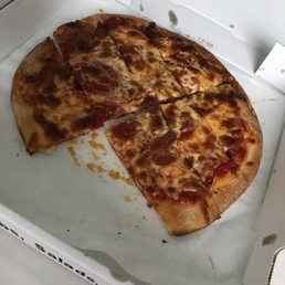 a half eaten pizza in a box a half eaten pizza in a box