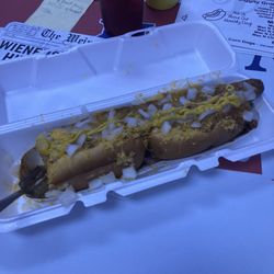Hot Dog Diggity - Foot long chili cheese dog with onions.