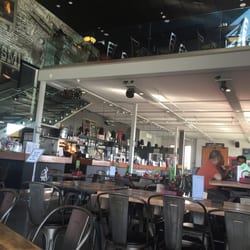 The Blacksmith Eatery and Bar - A view of the bar and upstairs seating area.