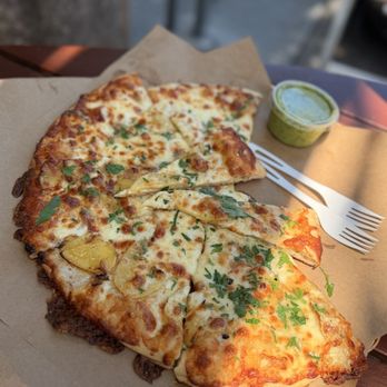 Cheese Board Pizza - Yukon potato, garlic oil, racictte cheese - Pizza Near Me - Berkeley, California