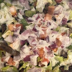 Loaded fries combo (gyro and jerk chicken) with veggies and white sauce