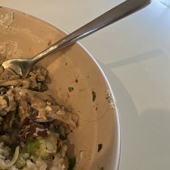 CAVA - a bowl of food with a spoon in it - Mediterranean Near Me - Potomac, Maryland CAVA - a bowl of food with a spoon in it - Mediterranean Near Me - Potomac, Maryland