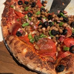 My pizza with sausage after I said no sausage! Still pretty good!