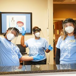 Andrea Washington, OD - Our staff is following COVID-19 protocols for your safety, but are still keeping things positive in the office!
